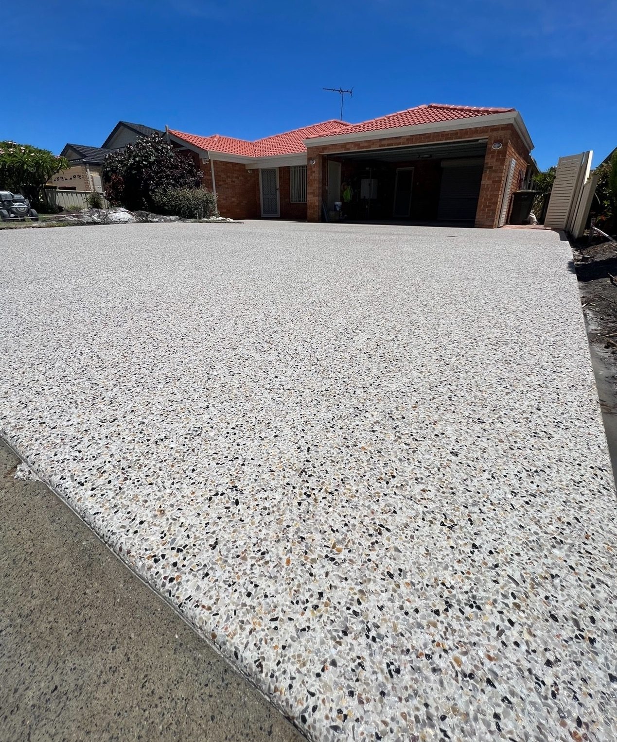 Double exposed aggregate driveway at an Officer home