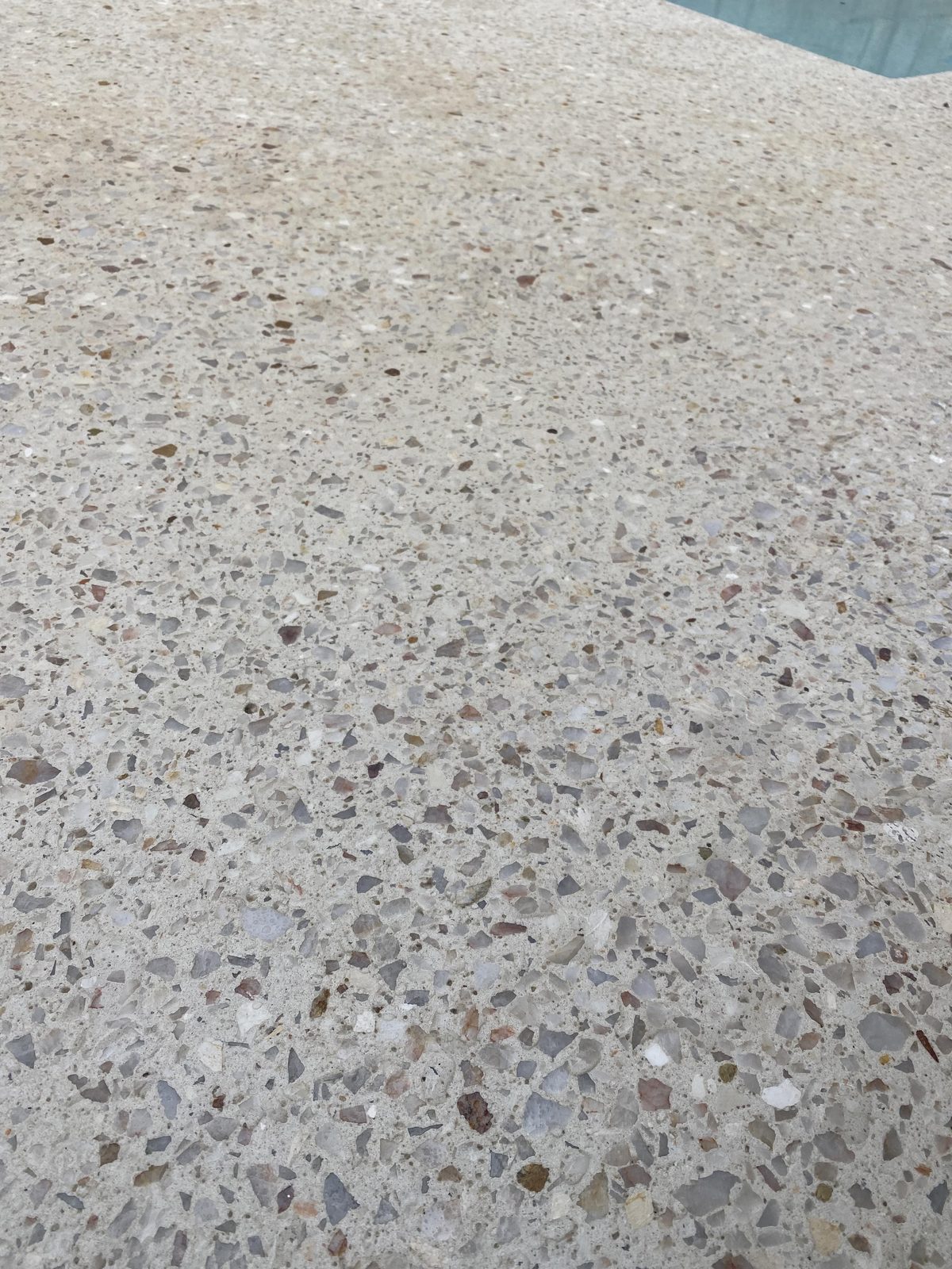 Honed aggregate pool deck detail in Berwick