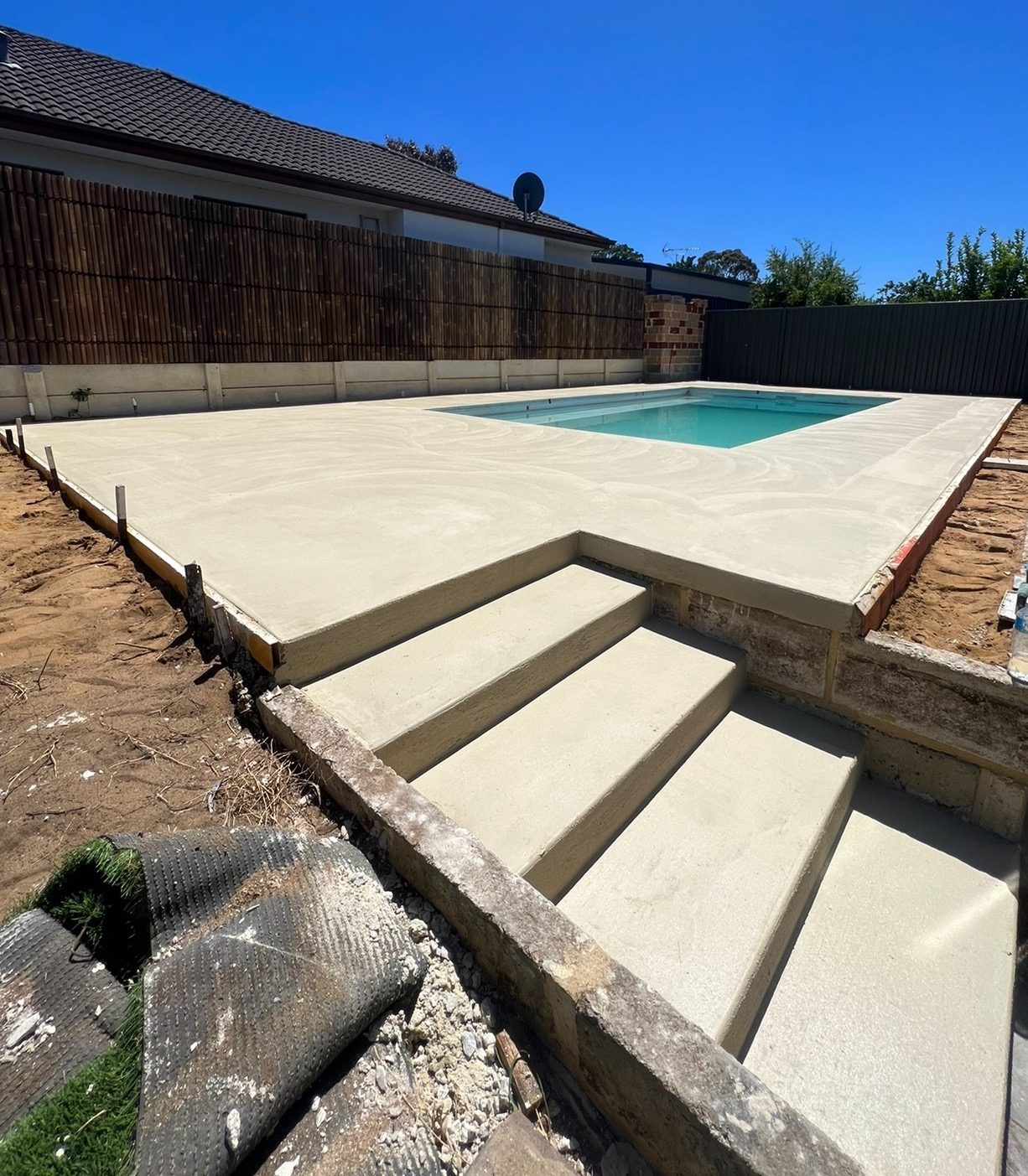 Limestone look pool surround in Beaconsfield Upper