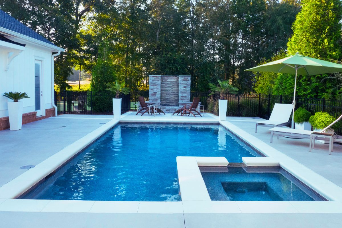 Plain grey concrete pool surround in Bunyip